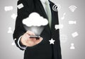 Businessman hand holding smart phone cloud connectivity Royalty Free Stock Photo