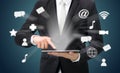 Businessman hand holding tablet cloud connectivity Royalty Free Stock Photo