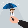 Businessman Hand Holding Tiny Umbrella