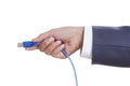 Businessman hand holding USB cable Royalty Free Stock Photo