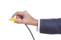 Businessman hand holding USB cable. Royalty Free Stock Photo