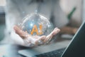 Businessman hand holding virtual global world with AI text. Concept of artificial intelligence technology, future digital network Royalty Free Stock Photo