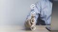 Businessman hand point to tick correct sign mark in checkbox for quality document control checklist and business approve project