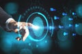 Businessman hand pointing at creative fingerprint interface on blurry bokeh background. Biometrics and security concept. Double