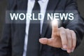 Businessman hand pressing news world button. Royalty Free Stock Photo