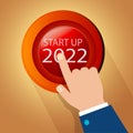 Businessman hand pressing start up 2022 number button on beginning business on new year Royalty Free Stock Photo