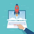 Businessman hand pushing the button to launch rocket from laptop screen. Business project startup, financial planning, idea Royalty Free Stock Photo