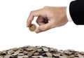 Businessman hand putting money coins, saving money concept, isolated on white background Royalty Free Stock Photo