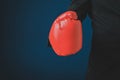 Businessman hand in red boxing glove Royalty Free Stock Photo