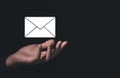 Businessman hand show email icon. electronic mail concept is online communication on the Internet network Receiving and sending Royalty Free Stock Photo