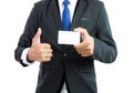 Businessman hand showing business card or note paper isolate Royalty Free Stock Photo