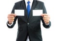 Businessman hand showing business card or note paper isolate Royalty Free Stock Photo