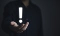 businessman hand showing exclamation point business development ideas Warning of errors, dangers, alerts, maintenance, And finding Royalty Free Stock Photo