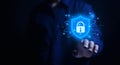 Businessman hand showing shield icon with lock sign Computer password protection concept, internet network security, digital cyber