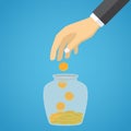 Businessman hand throwing a glass jar gold coin. Royalty Free Stock Photo