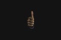 Businessman hand thumb up or like to good signal on black background Royalty Free Stock Photo