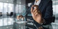Businessman hand touching transparent digital dashboard screen featuring complex business analytics and financial data graphics Royalty Free Stock Photo