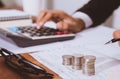 businessman hand using calculator Calculating bonus Royalty Free Stock Photo