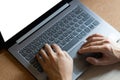 Businessman hand using laptop computer Royalty Free Stock Photo