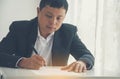 Businessman hand using pen signing on new contract starting projects in conference room. Close up business manager man hands sign Royalty Free Stock Photo