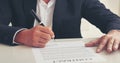 Businessman hand using pen signing on new contract to starting projects in conference room. Close up business manager man hands Royalty Free Stock Photo