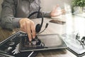 Businessman hand using VOIP headset with digital tablet computer