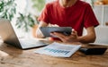 businessman hand working with new modern computer and writing on the notepad strategy diagram as concept morning light Royalty Free Stock Photo