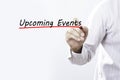 Businessman hand writing Upcoming Events, Business concept. Royalty Free Stock Photo