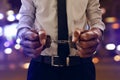 Business man in handcuffs at night Royalty Free Stock Photo