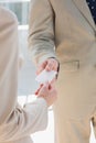 Businessman handing card to businesswoman Royalty Free Stock Photo