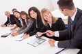 Businessman Handing Out A Business Card Royalty Free Stock Photo