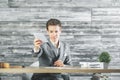 Businessman handing paper sheet