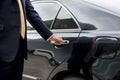 Businessman Handle Limousine Door Car Concept
