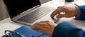 Businessman hands busy using laptop at office desk Royalty Free Stock Photo