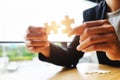 Businessman hands connecting jigsaw puzzle Royalty Free Stock Photo