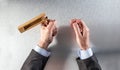 Businessman hands holding traditional noisemaker for religious celebration or communication