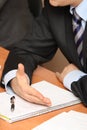 Businessman hands and notepad