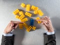 Businessman hands picking the odd one for concept of priority Royalty Free Stock Photo