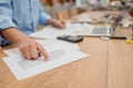 Businessman hands point paper graph and checking document data calculator for calculate budget accountancy. finance and accounting Royalty Free Stock Photo