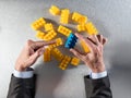 Businessman hands selecting the different piece for concept of priority Royalty Free Stock Photo