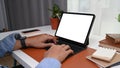 Businessman hands typing keyboard of computer tablet at home office desk. Royalty Free Stock Photo