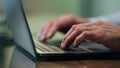 Businessman hands working computer keyboard indoors close up. Boss typing laptop Royalty Free Stock Photo