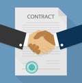 Businessman handshake on contract paper after agreement Royalty Free Stock Photo