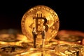 Businessman handshake on Gold Bitcoin coins