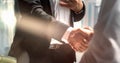 Businessman handshake for teamwork of business merger and acquisition