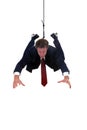 Businessman hanging by a rope for product placemen