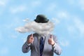 Businessman in a hat, with a cloud instead of a head. Creative thinking, creativity, business concept.