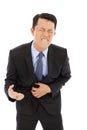 Businessman have stomach pain isolated on a white