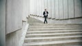 Businessman having conversation on smartphone outdoors. Worker walking for job Royalty Free Stock Photo