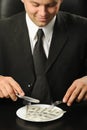 The businessman having dinner dollars Royalty Free Stock Photo